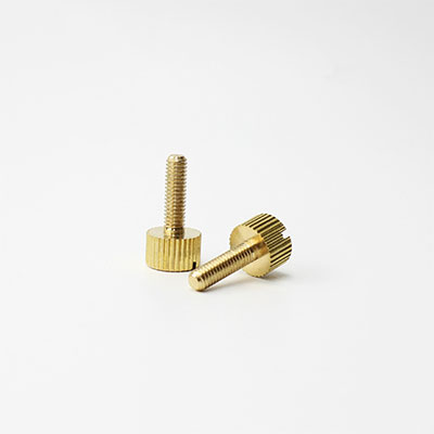 Mirror-turned brass screws